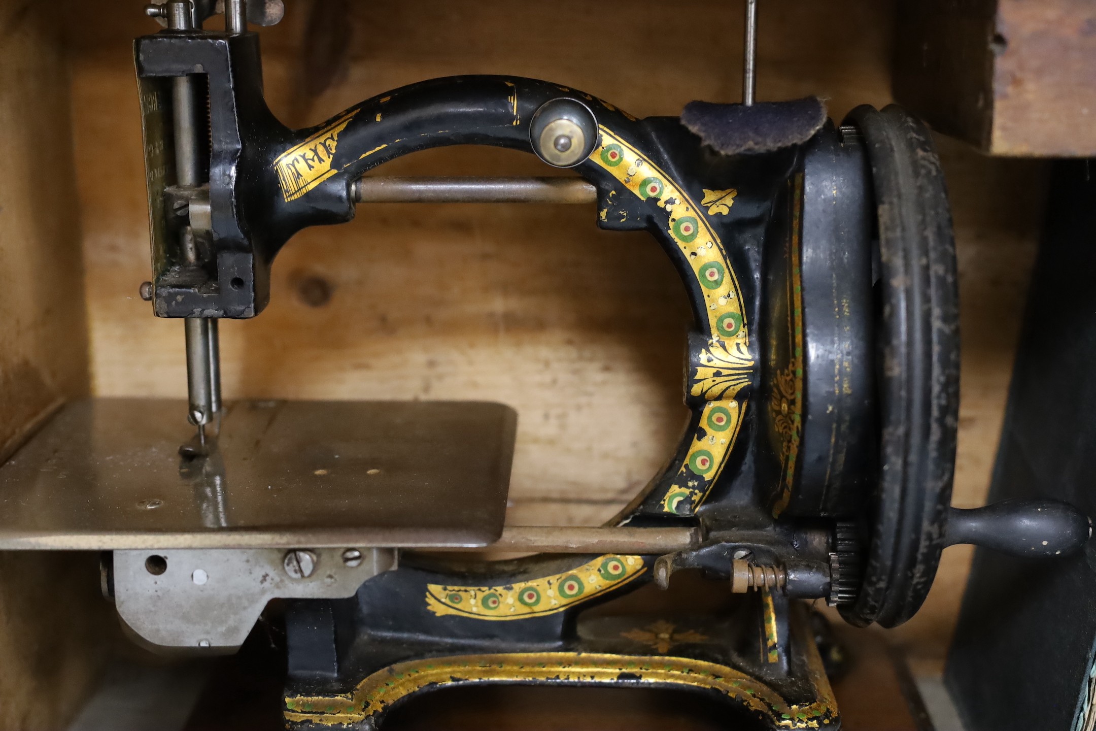 A Smith & Co. The Monarch sewing machine with original case and manual